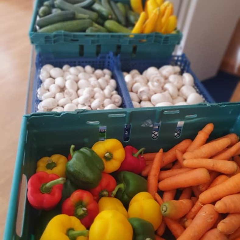 Crates of courgettes, mushrooms, peppers and carrots